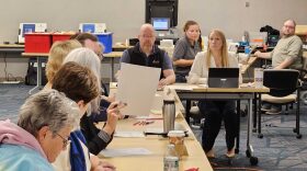 Members of the Cass County Canvassing Board prepare to review ballots Nov. 18, 2024, in Fargo. At the head of the table are Cass County Commission Chair Chad Peterson, left, and Finance Director Brandy Madrigga.