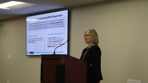 DHS Division of County Operations Director Mary Franklin answers questions about new community and work requirements for Arkansas Medicaid recipients at a town hall in Little Rock.