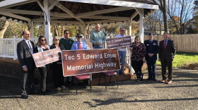 Sen. Patrick Gallivan and family of Tec. 5 Edward Enser gather to rename a portion of Route 75.