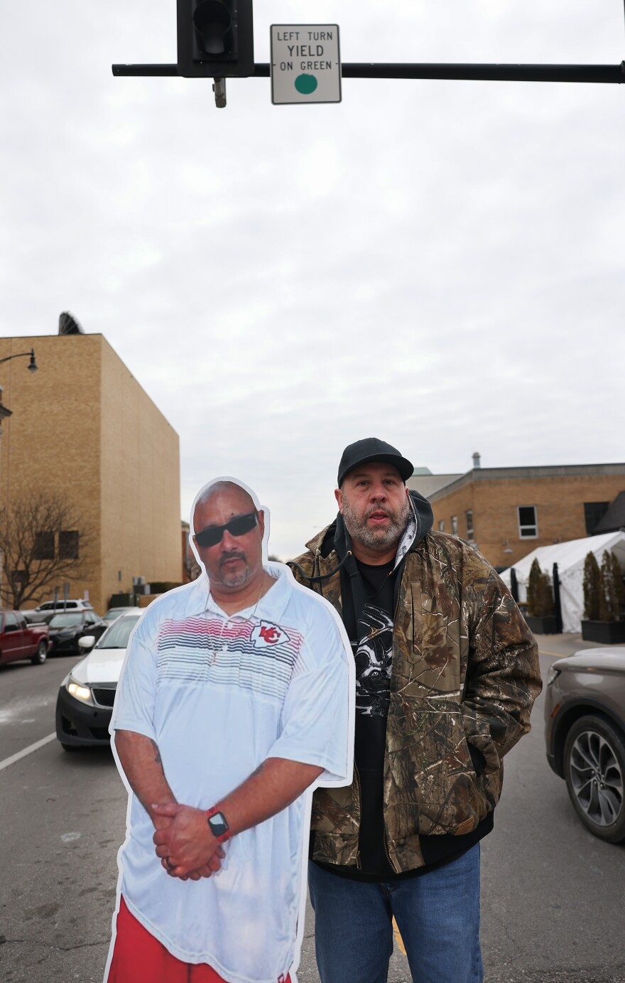 Robert Olson poses with a cardboard cutout of his friend Owen Ramsingh on Friday, Jan. 23, 2026, on Sixth Street in Columbia. Ramsingh, who has lived the United States since he was five years old, has been held in ICE detention since Sept. 30, 2025.