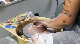 JaiDe Brown leads a cermanics demonstration during a recent class at City Arts in downtown Wichita.