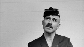 Los Angeles based singer, songwriter Joshua Thomas poses with what looks to be a scuba mask on his head.