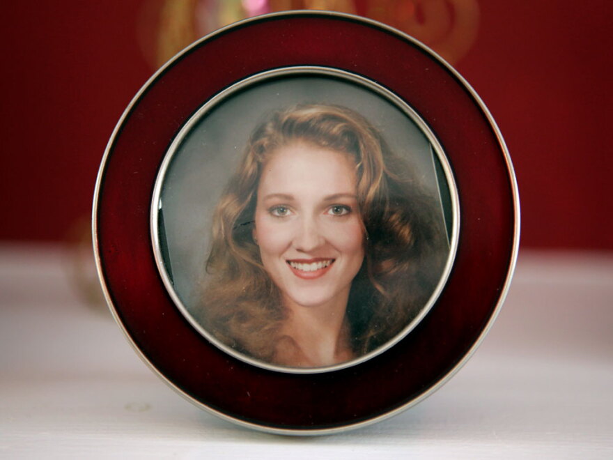 A photo of Tiffanie Collins sits on the mantel at the Collins home in Fairfax, Va.