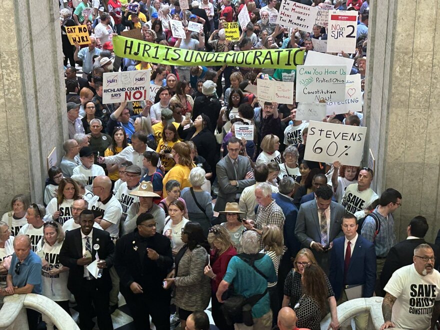 Protestors, both for and against House Joint Resolution 1, fill the statehouse on the day the House voted on if they'll ask voters to make it harder to amend the constitution in a statewide special election in August.