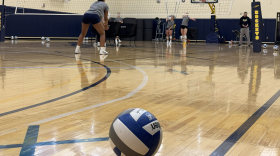 The ladies on the University of Toledo's volleyball team take turns spiking and bumping during a practice. The university is one of the first to mandate A.I. training for the entire athletic department staff.