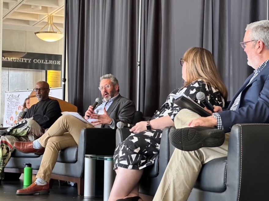 From Left: Rodney Veal, Sam Dorf, Stephanie Keinath and Matt Dunn share highlights from their respective breakout session discussions at the inaugural Montgomery County Arts Forum.