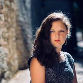 A photo portrait of Molly McCully Brown.