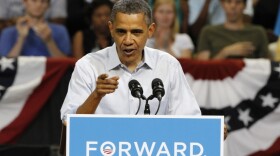 President Obama, seen earlier this month at a Virginia rally, launched a TV and Web campaign Monday criticizing Romney's record on job creation.