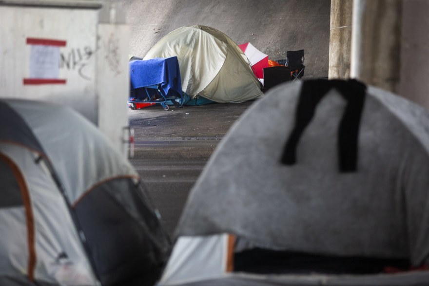 A homeless encampment under I-35 near the Austin Police Department headquarters on March 23, 2020.