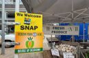 A Supplemental Nutrition Assistance Program, or SNAP, sign at the farmers market in Scissortail Park in Oklahoma City.