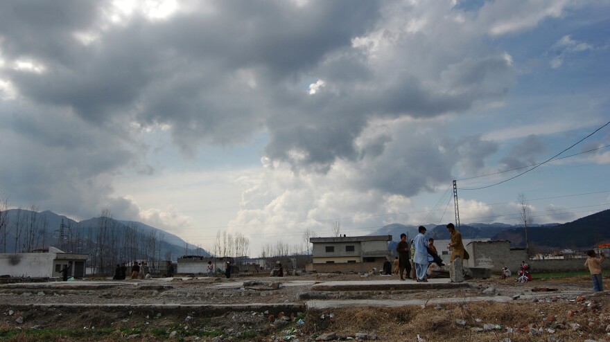 Children play at the demolished compound of Osama bin Laden in Abbottabad, Pakistan.