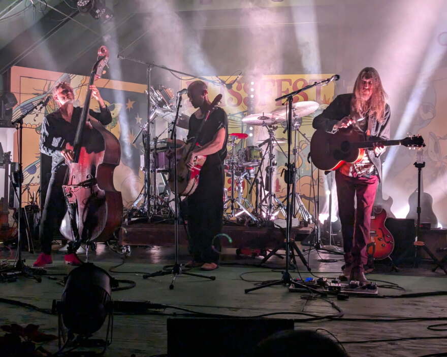 A band performs on the Blissfest main stage during the 2026 festival. Rachel Graham said she’s attended the festival for 20 years and now brings her kids along.