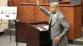 Simon Bouie waves to his family during a hearing where his record was cleared after he was arrested in 1960 for sitting at an all-white South Carolina lunch counter on Friday, Oct. 25, 2024 in Columbia, S.C.