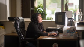 Kisharra Angelety, special projects coordinator at 232-HELP or 211, has been answering calls and logging call data throughout the pandemic.