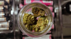 Happy Clouds smoke shop on Guadalupe Street in Austin displays hemp flower bud on March 30, 2026, the day before the state banned its sale.