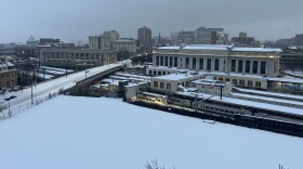 A train leaves a snow covered Penn Station in Baltimore on Sunday, January 25, 2026.