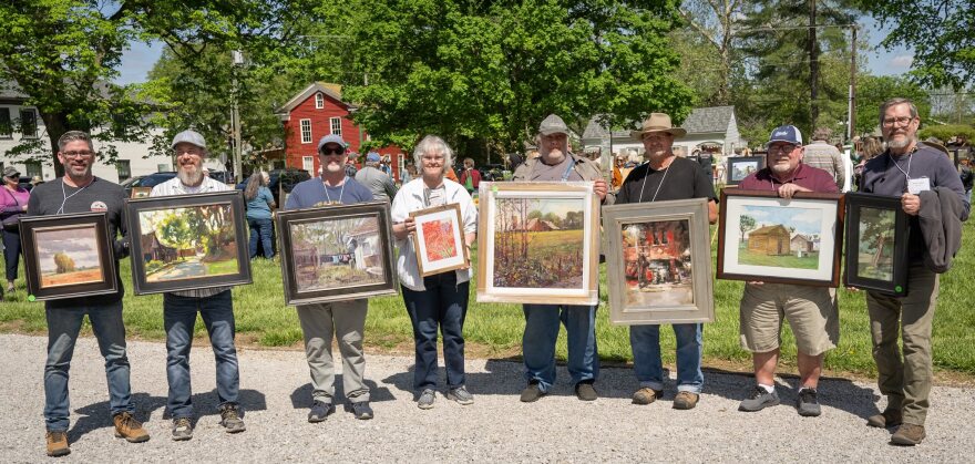 Artists display their paintings at a previous First Brush of Spring event in New Harmony, IN
