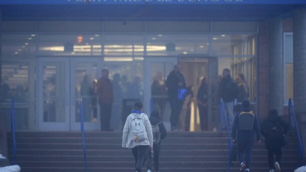 Students arrive at Perry Middle School on Jan. 25.