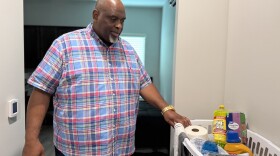 Todd Walker, executive director of the Judeo-Christian Outreach Center, stands in one of the 38 new affordable apartments in the center's new Virginia Beach complex. The center's ribbon cutting for the new Macon & Joan Brock House was June 17.
