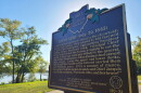 a brown historical marker sign