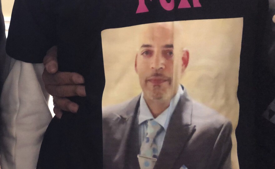 Andre Hill, fatally shot by Columbus Police on Dec. 22, is memorialized on a shirt worn by his daughter, Karissa Hill, in Columbus, Ohio, on Dec. 31.