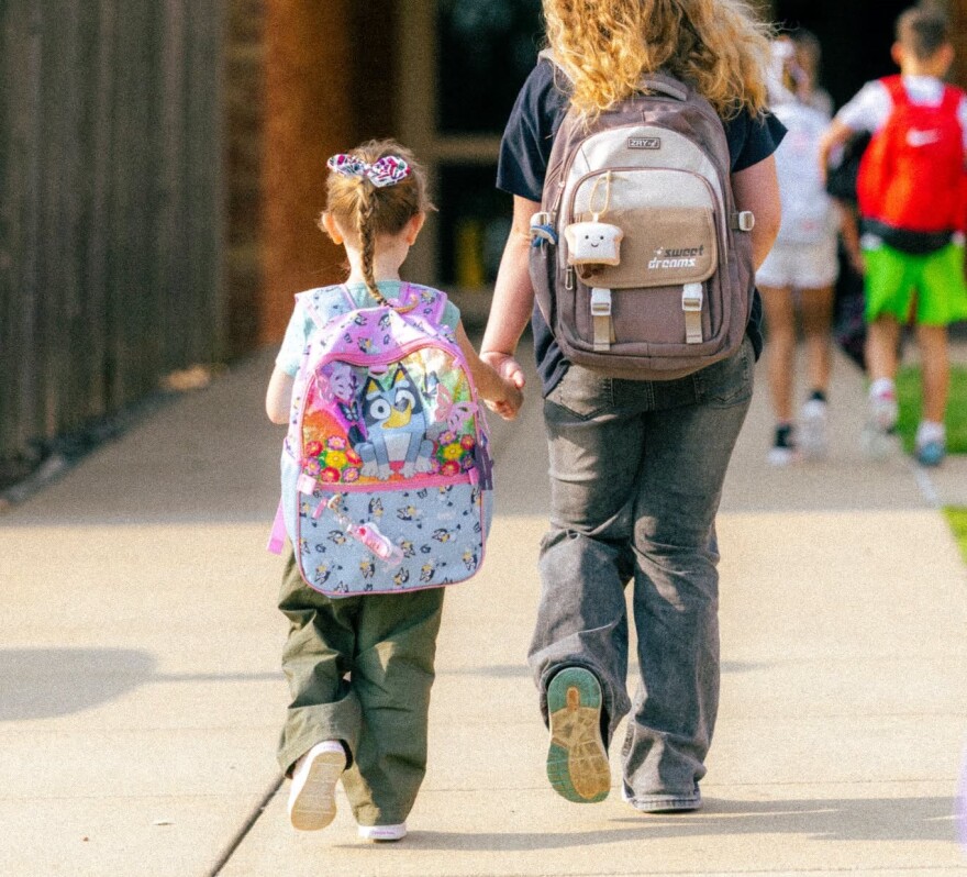 A parent and student on the first day of school in the EVSC, Aug. 10, 2026