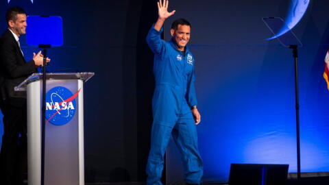 Artemis III crew member Frank Rubio waves to the crowd during a press conference at Johnson Space Center on Tuesday, June 9, 2026, in Houston. (Annie Mulligan/AP)