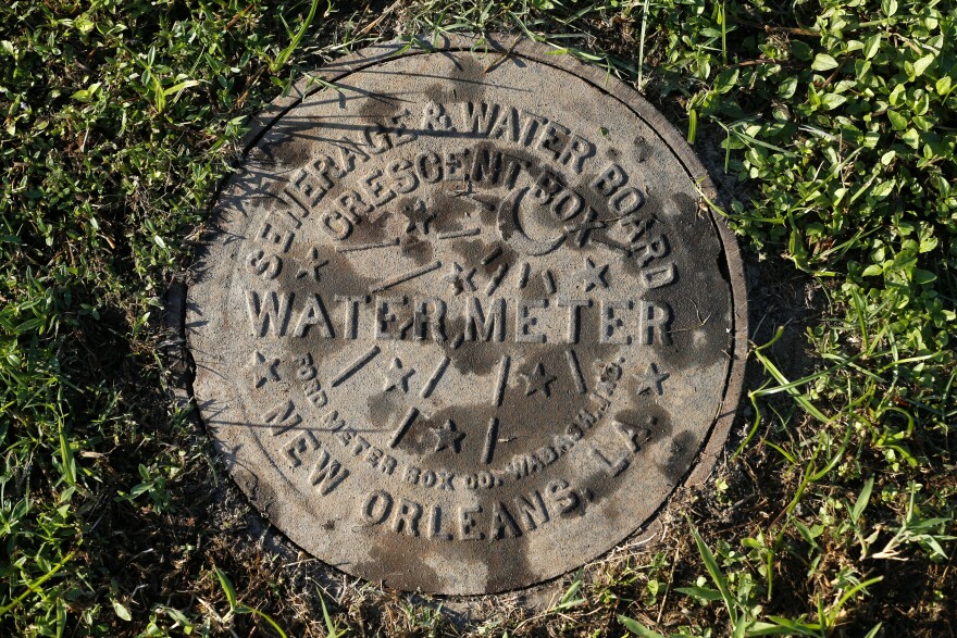 ADVANCE FOR SATURDAY, SEPT. 26, AND THEREAFTER - This Sunday, Jan. 20, 2015, photo, shows a water meter cover in New Orleans. Water rates have been shooting up nationwide in drought-stricken states and in cities trying to upgrade their aging infrastructure. Experts say the trend is sure to accelerate as the cost of water, treatment and delivery comes into line with how essential it is to our daily lives. (AP Photo/Jonathan Bachman)