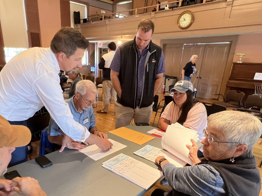 Sandwich Town Clerk Taylor White, left, gives instructions to election workers and volunteers as Sandwich recounts votes in a Republican primary for state Senate, Sept. 11, 2024.