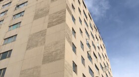 The Polaris building and machinery that will soon help tear it down.