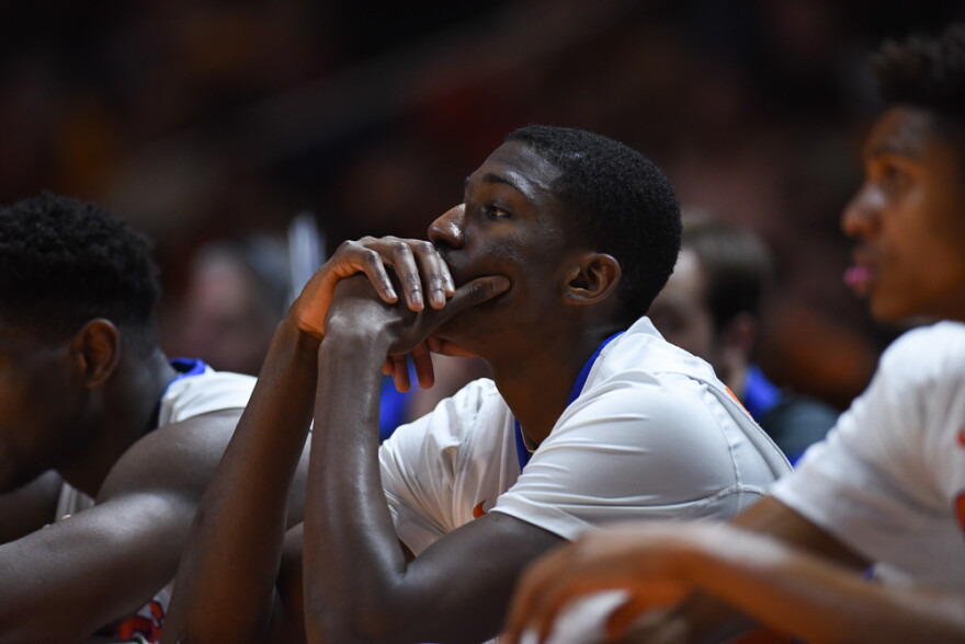 As the final seconds of the game clock expire and the Volunteer's claim a 83-69 victory over the Gators, Florida's DeVon Walker (1) watches from the bench. (Greenberry Taylor/WUFT News)