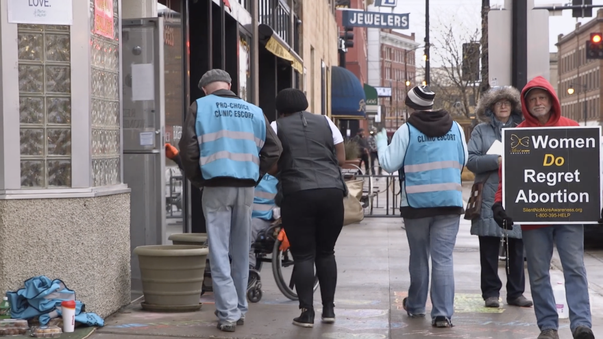 Lindsay Beyerstein's documentary 'Care in Chaos' captured protesters outisde of an abortion clinic and clinic escorts walking with patients.