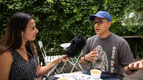 Luz Moreno-Lozano, KUT News' City Hall reporter, interviews Sergio Trujillo, co-owner owner of Desnudo Coffee.