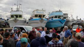 EPA officials hold an impromptu town hall in Dillingham’s boat yard on Thursday morning. (Photo by Alex Hager/KDLG)