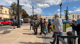 Members of an activist rapid response team film ICE agents outside a courthouse in Meriden on Wednesday, Sept. 23, 2026.