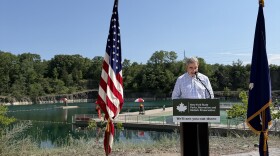 Palisades Regional Director for New York State Parks Joshua Laird stands in front of Lake Sophia at the ribbon-cutting press conference.