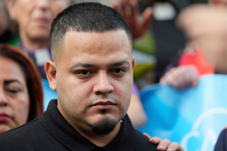 FILE - Kilmar Abrego Garcia joins supporters in a protest rally outside the Immigration and Customs Enforcement field office in Baltimore, Aug. 25, 2025. 