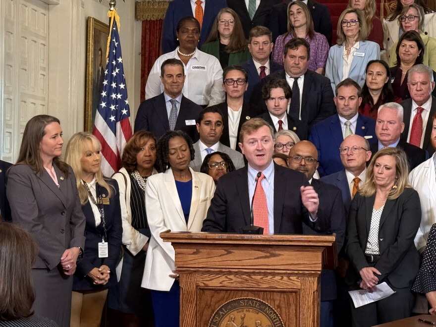 Sen. Benton Sawrey, R-Johnston, speaks during a bill signing for House Bill 696 on Thursday, April 30. Sawrey was one of the key negotiators for the compromise legislation, which provided $319 million to fund Medicaid for the rest of the year.