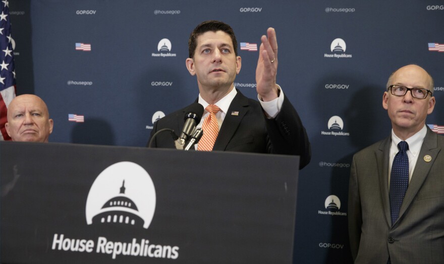 House Speaker Paul Ryan, flanked by House Ways and Means Committee Chairman Rep. Kevin Brady, R-Texas (left) and House Energy and Commerce Committee Chairman Rep. Greg Walden of Oregon, meet with reporters on Capitol Hill on Tuesday.