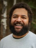 a portrait of a man outside