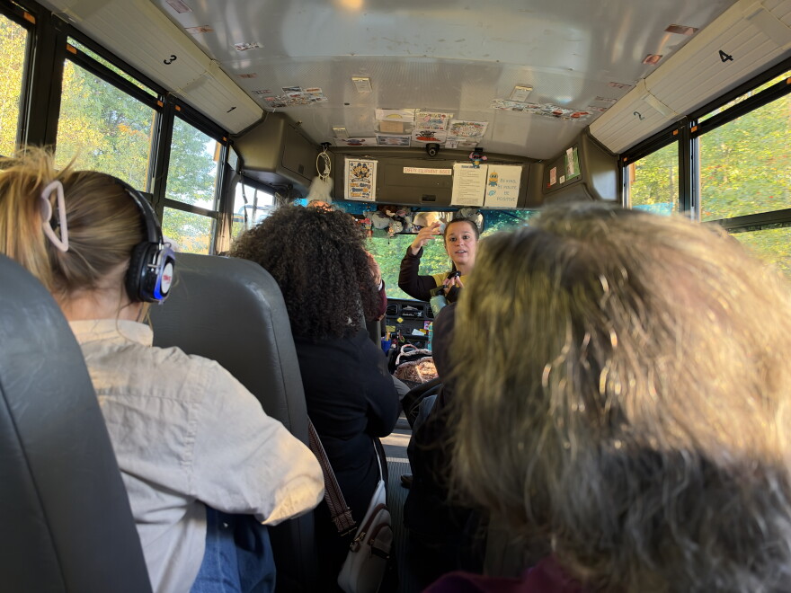 Tamara Misewicz-Healey, cofounder of the Stop Archbald Data Centers group, speaks during a bus tour through the borough.