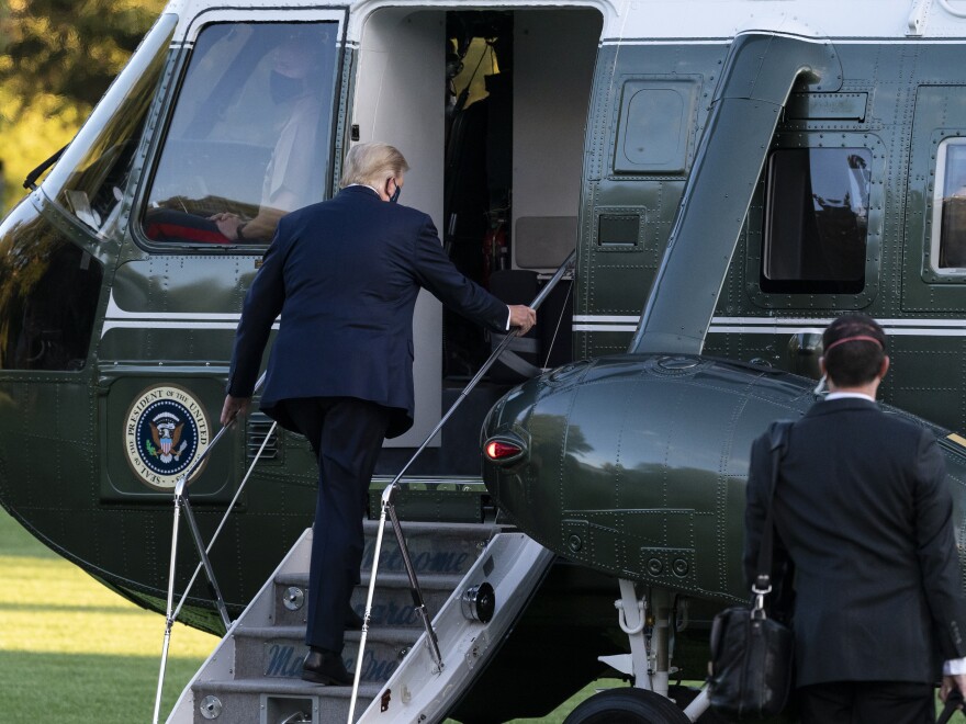 President Trump boards Marine One for a trip from the White House to Walter Reed National Military Medical Center for COVID-19 treatment in early October. Trump received Regeneron's antibody cocktail during his illness.
