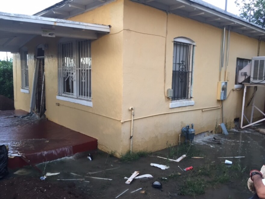Waste spilled out of this house in Nogales where authorities found an underground tunnel leading to the sewer line