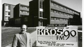 Pictured is KRPS's first General Manager, Frank Baker standing in front of Shirk. The building was originally constructed in 1958 as a men's only dorm and renovated in 1988 to house KRPS.