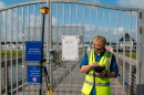 Derek Thorn, a geographer with the U.S. Army Corps of Engineers, Charleston District, conducts topographic surveys near Brittlebank Park and the Ashley River bridges on the westside of downtown Charleston, South Carolina, Sept. 11, 2026, to determine precision elevation markers for the planned perimeter storm surge barrier. The Charleston Peninsula Coastal Storm Risk Management project kicked off in 2018 to reduce storm surge risks, protect vital transportation corridors, and bolster long-term coastal resilience across the low-lying peninsula with an engineered 10-foot NAVD88 barrier alignment. (U.S. Army Corps of Engineers photo by Dylan Burnell)