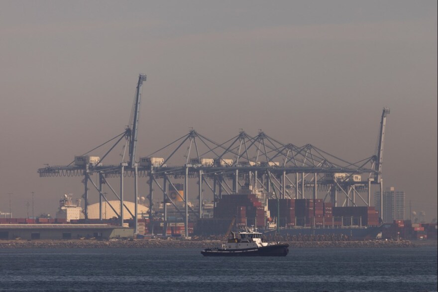 A layer of smog lingers above the Port of Long Beach where tankers and container ships cruise in and out of, Monday, March 10, 2025, in San Pedro, Calif.