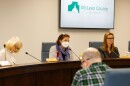 New McLean County Board chair Elizabeth Johnston, center, alongside County Clerk Kathy Michael, left, and County Administrator Cassy Taylor.