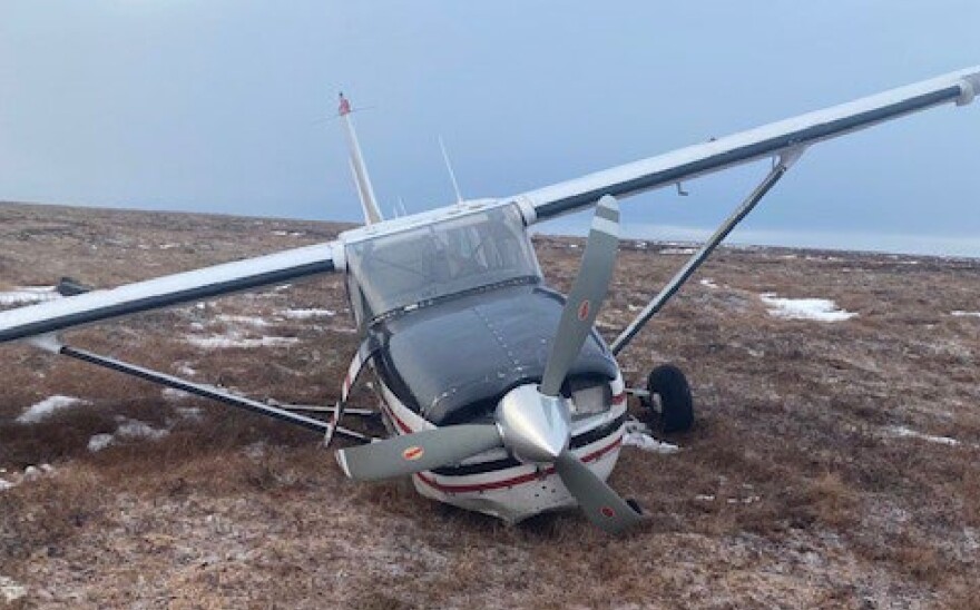 A Cessna 207 operated by Yute Commuter Service is seen on the tundra where it crashed near Bethel in November 2022.