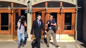 In this file photo, former Washington state Auditor Troy Kelley leaves the U.S. District Courthouse in Tacoma. On Friday, Kelley won a motion to remain free on bail pending his appeal to the Ninth Circuit Court of Appeals.