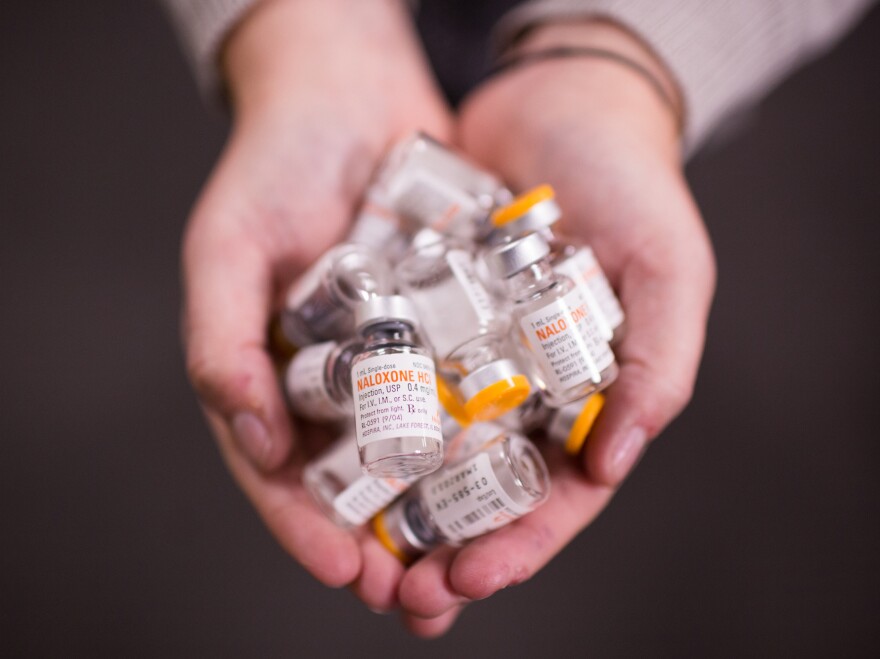 Tina Wolf includes vials of naloxone in the rescue kits she gives to people she trains.